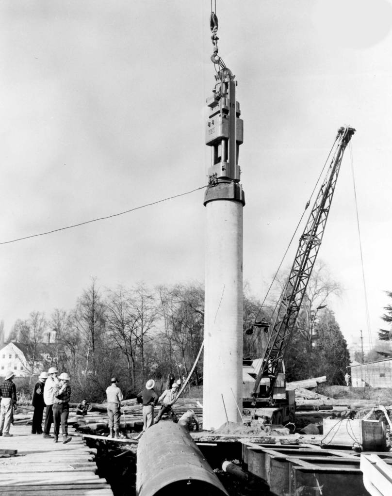 A Vulcan 020 starts to drive a cylinder pile for the test pile program for the Portage Bay Bridge project in Seattle, Washington